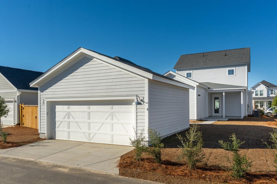 Front exterior of a new home in , Summerville, SC, highlighting curb appeal (Image 31). Front exterior of a new home in , Summerville, SC, highlighting curb appeal (Image 31).