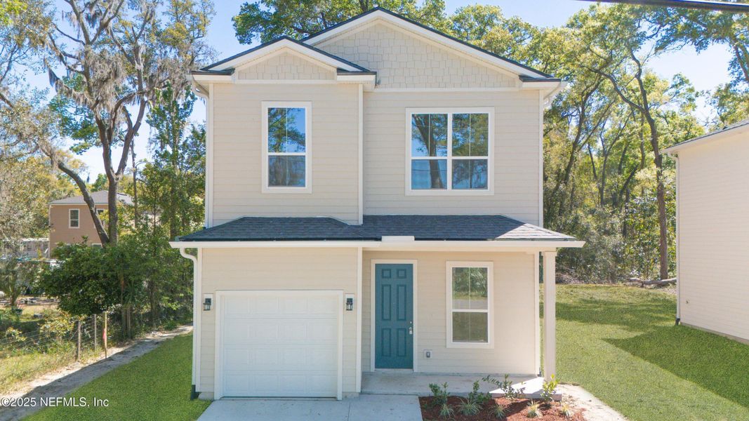 Front exterior of a new home in , Jacksonville, FL, highlighting curb appeal (Image 1). Front exterior of a new home in , Jacksonville, FL, highlighting curb appeal (Image 1).