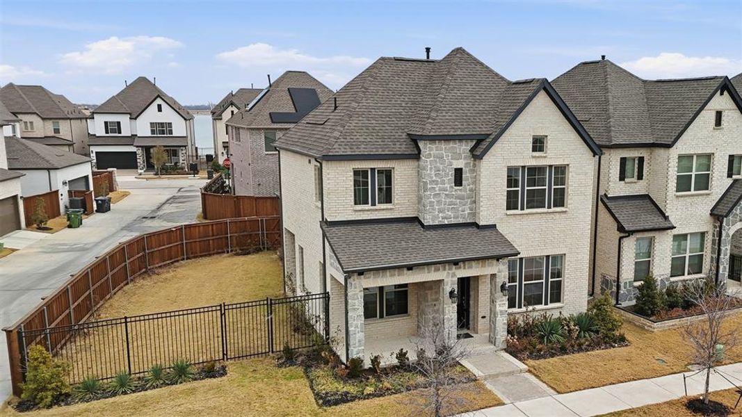 Front exterior of a new home in , Arlington, TX, highlighting curb appeal (Image 27).