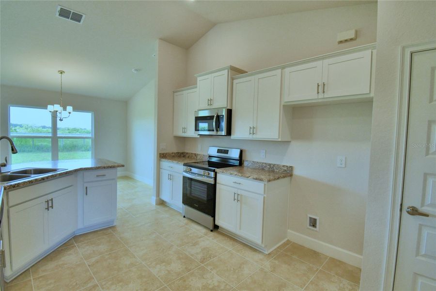 Furnished interior view inside a new home in Cadence Crossing, Auburndale (Image 5).