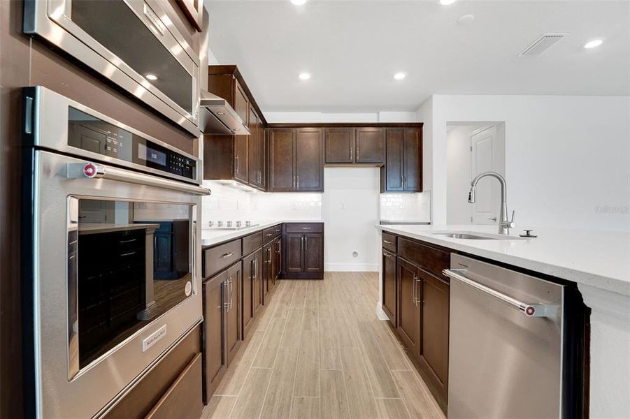 Furnished interior view inside a new home in Seaire, Parrish (Image 6).