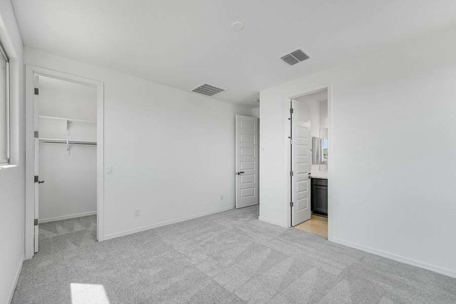 Representative unfurnished interior of a home built from the Kingston by Taylor Morrison in Combs Ranch, Queen Creek (Image 27).