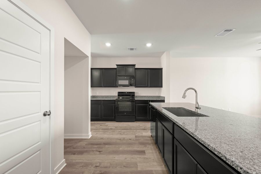 Furnished interior view inside a new home in The Village at Elm Creek, Troy (Image 4).