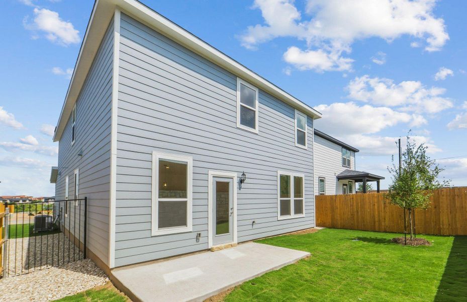 Exterior details and patio area of a home in Cameron Place, Manor (Image 21).
