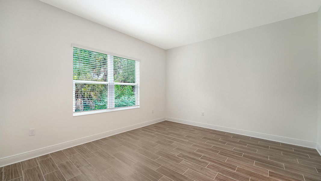 Spacious, unfurnished interior of a new home in Wildleaf Real Estate and Homes for Sale in Parrish, FL - Neal Communities, Parrish (Image 15). Spacious, unfurnished interior of a new home in Wildleaf Real Estate and Homes for Sale in Parrish, FL - Neal Communities, Parrish (Image 15).