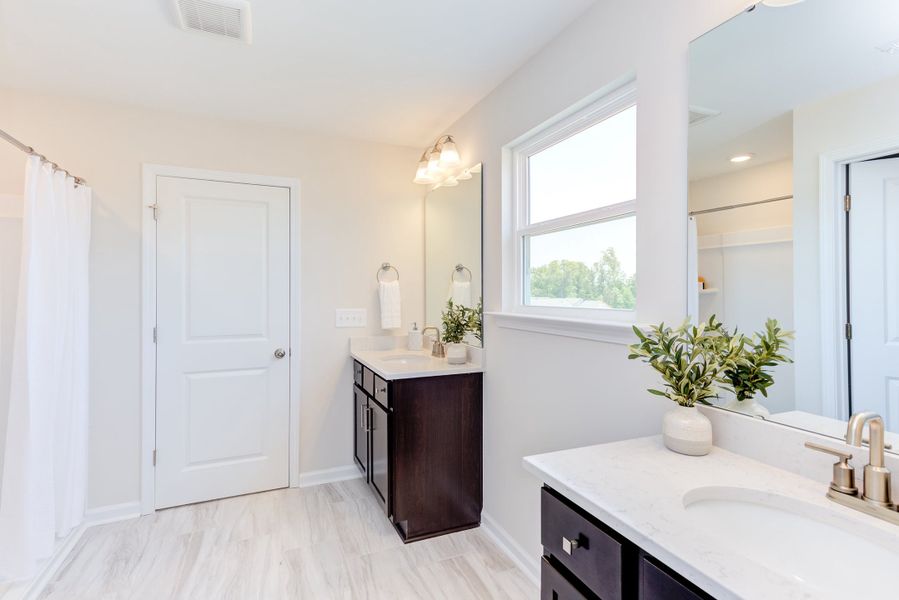 Representative furnished interior of a home built from the The Poppy by Chesapeake Homes in The Willows, Loris (Image 34).