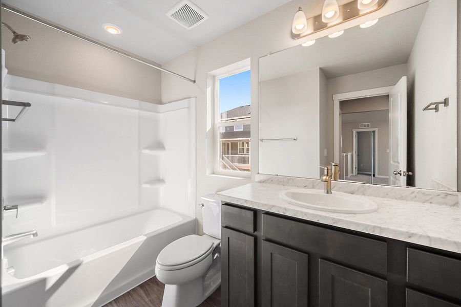 Furnished interior view inside a new home in Ridge at Lorson Ranch, Colorado Springs (Image 9).