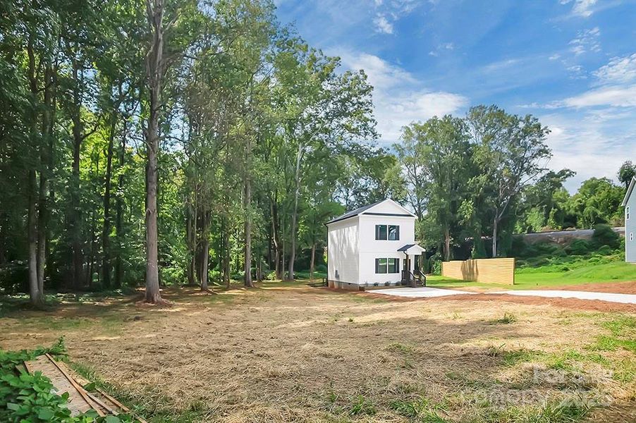 Front exterior of a new home in , Shelby, NC, highlighting curb appeal (Image 27).