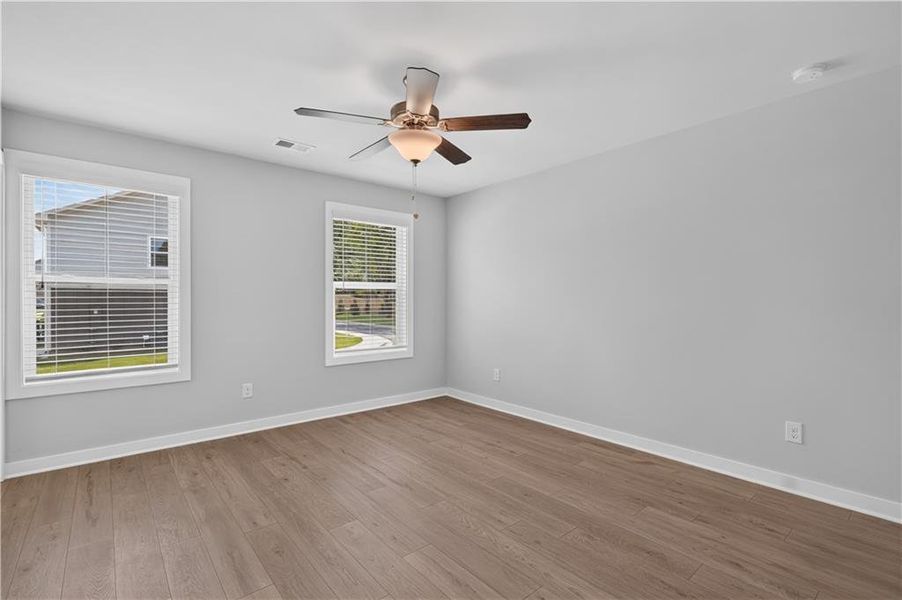 Spacious, unfurnished interior of a new home in The Cottages at East Lanier, Fayetteville (Image 13).