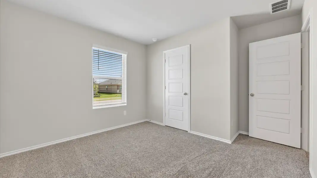 Spacious, unfurnished interior of a new home in Monarch at the Meadows, Ponder (Image 20).