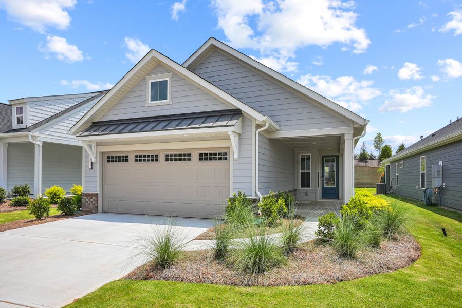 Front exterior of a new home in Carolina Riverside, Belmont, NC, highlighting curb appeal (Image 30). Front exterior of a new home in Carolina Riverside, Belmont, NC, highlighting curb appeal (Image 30).