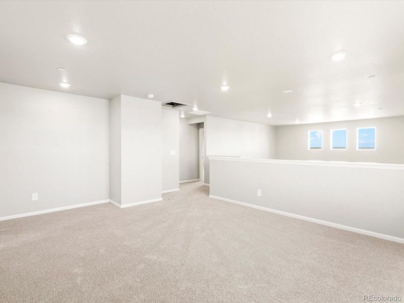 Spacious, unfurnished interior of a new home in Buffalo Highlands: The Flora Collection, Commerce City (Image 12).