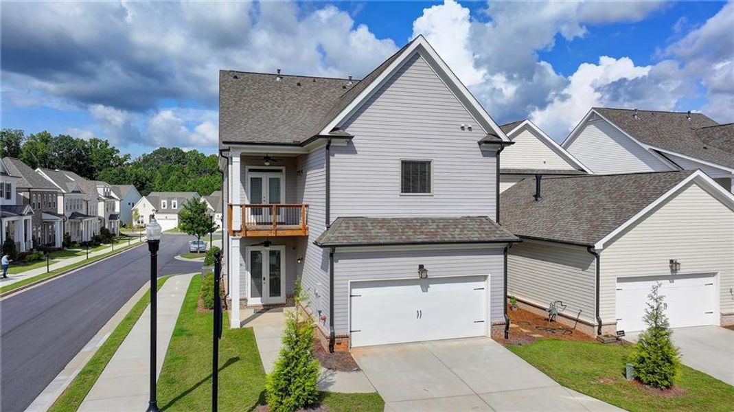 Front exterior of a new home in , Duluth, GA, highlighting curb appeal (Image 27).
