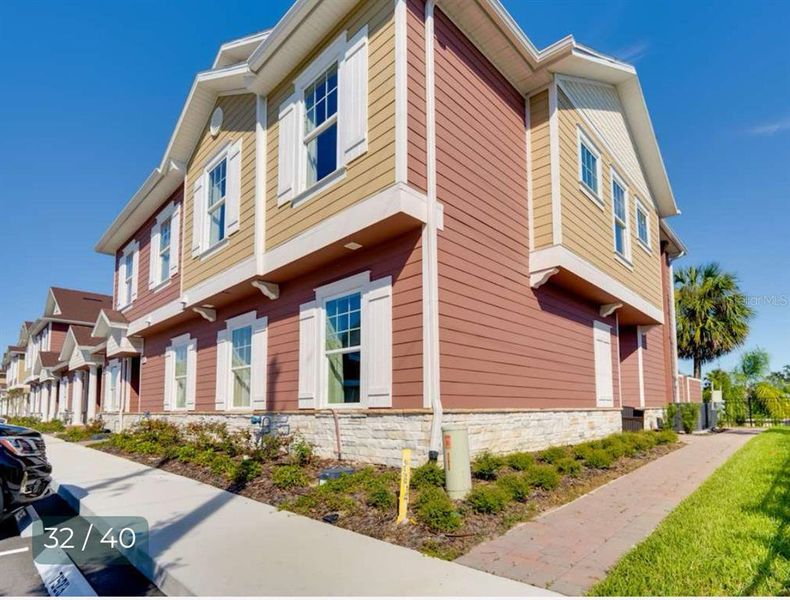 Front exterior of a new home in , Kissimmee, FL, highlighting curb appeal (Image 1). Front exterior of a new home in , Kissimmee, FL, highlighting curb appeal (Image 1).