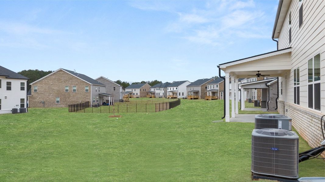 Exterior details and patio area of a home in The Gates at Pates Creek, Hampton (Image 26).