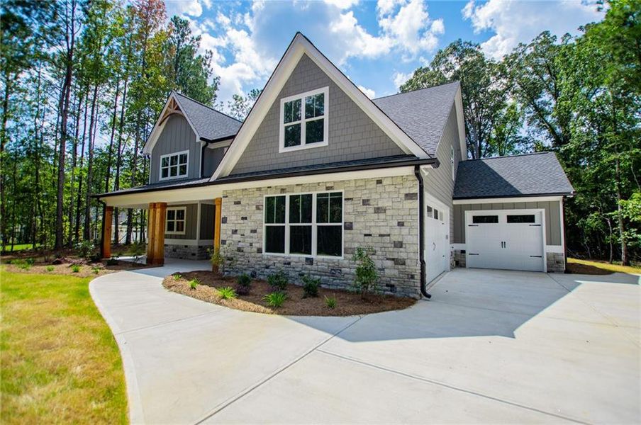 Front exterior of a new home in , Douglasville, GA, highlighting curb appeal (Image 27).