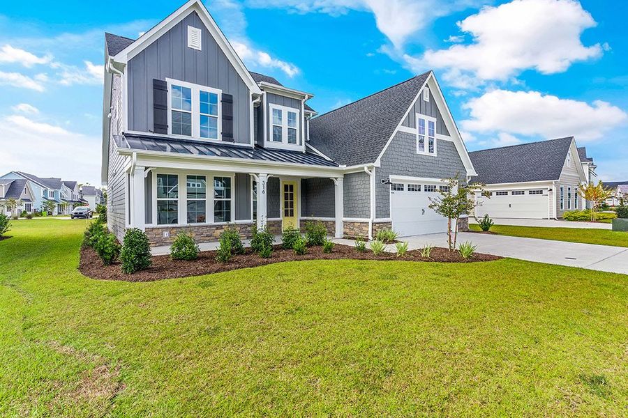 Representative exterior photo of a completed home built from the The Chandler by RobuckHomes in Windwater, Hampstead, NC (Image 20).