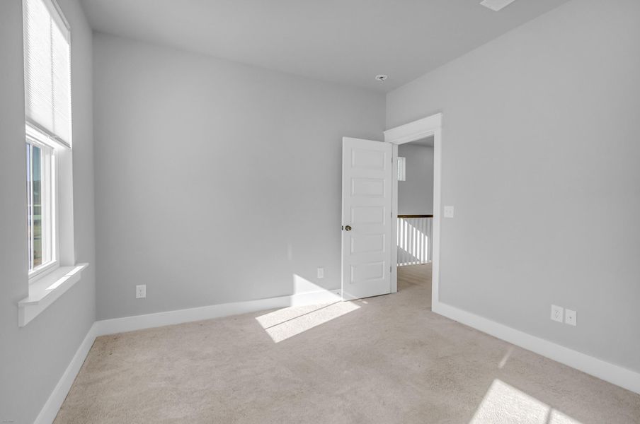 Spacious, unfurnished interior of a new home in Carnes Crossroads: Row Collection, Summerville (Image 31). Spacious, unfurnished interior of a new home in Carnes Crossroads: Row Collection, Summerville (Image 31).