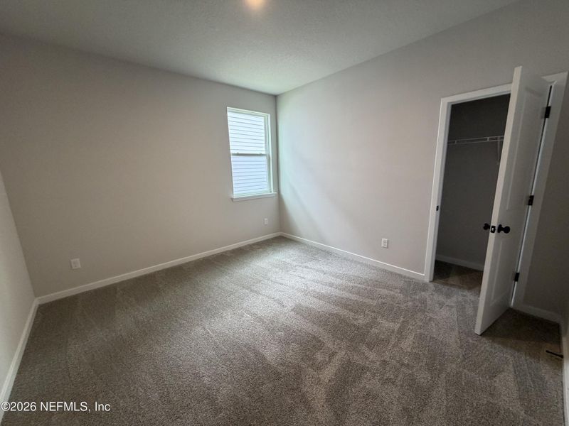 Spacious, unfurnished interior of a new home in Reserve East, Flagler Beach (Image 46).