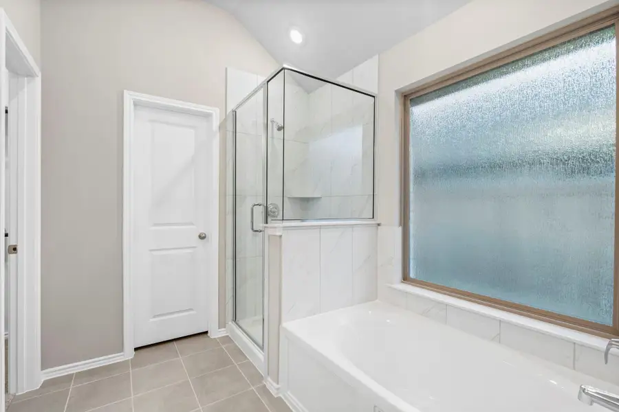 Furnished interior view inside a new home in Bridgeland, Cypress (Image 9).