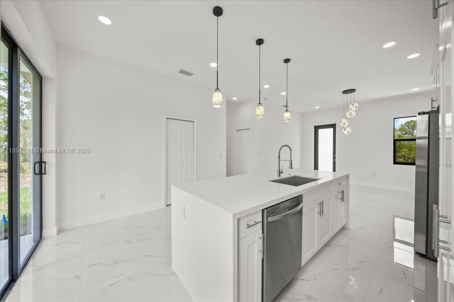 Furnished interior view inside a new home in , Lehigh Acres (Image 3). Furnished interior view inside a new home in , Lehigh Acres (Image 3).