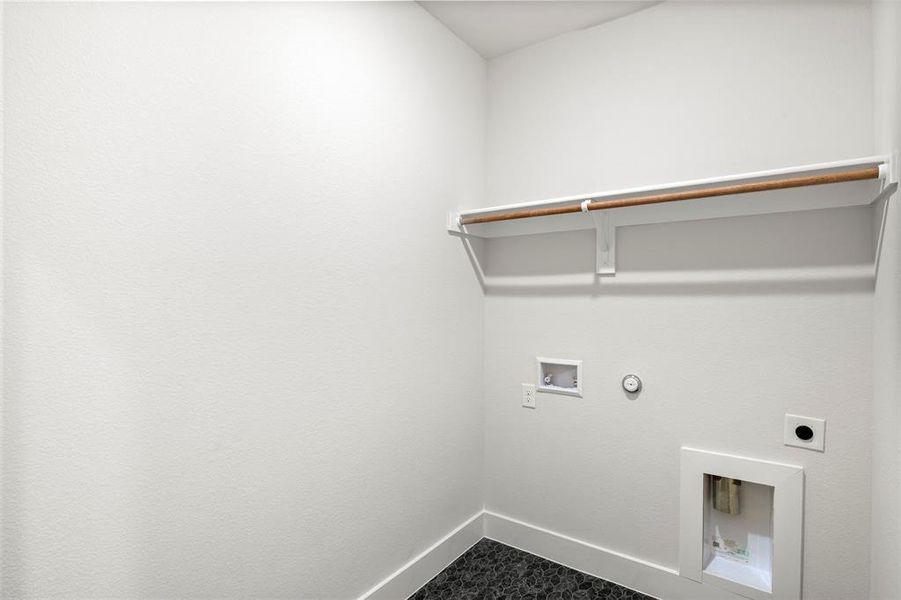 Laundry room with hookup for a gas dryer, washer hookup, and hookup for an electric dryer