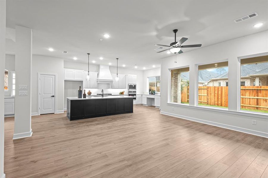 A wall of windows across the rear of home provides lots of light!