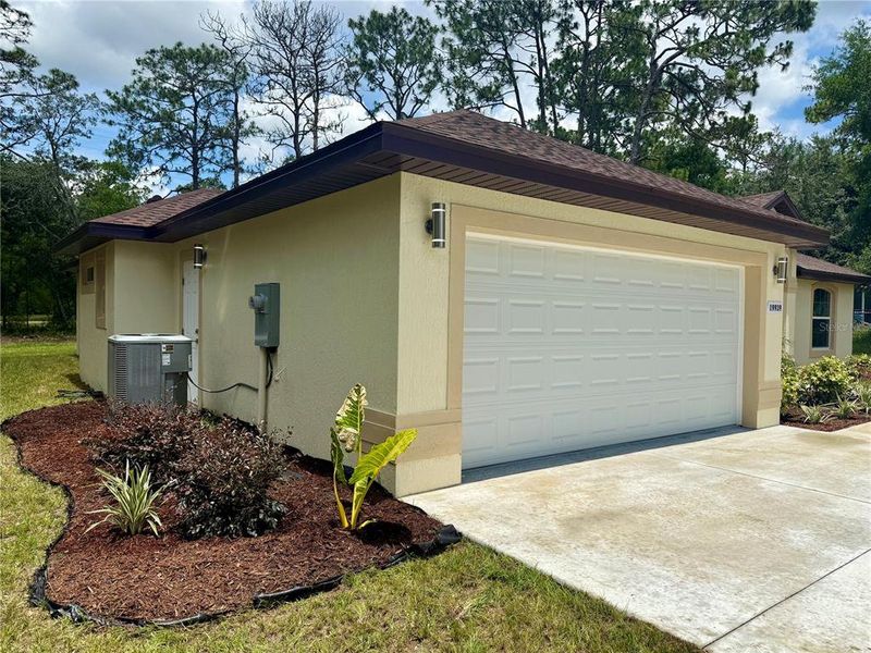 Front exterior of a new home in , Dunnellon, FL, highlighting curb appeal (Image 34).