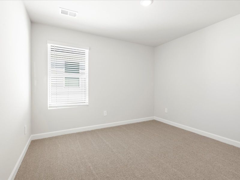 Spacious, unfurnished interior of a new home in The Farm at Wells Creek - Signature Collection, Gray Court (Image 18).