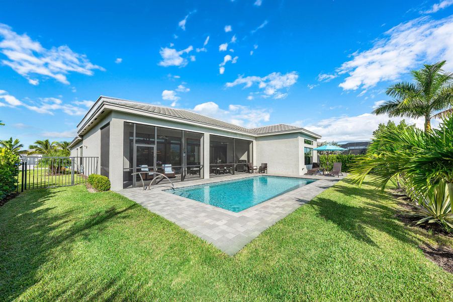 Exterior details and patio area of a home in Valencia Grand, Boynton Beach (Image 21). Exterior details and patio area of a home in Valencia Grand, Boynton Beach (Image 21).