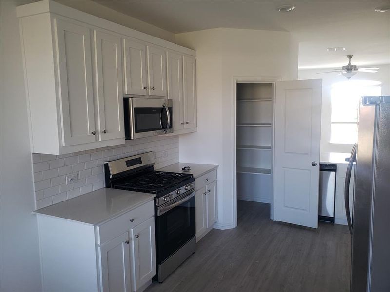 Stove w / Hanging Microwave Pantry Door Open