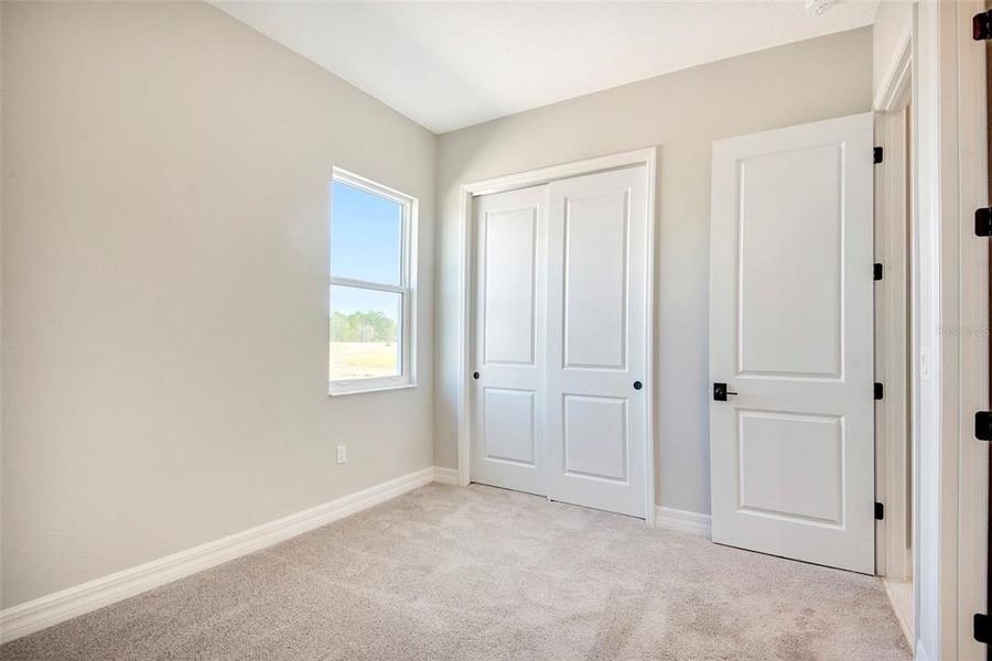 Spacious, unfurnished interior of a new home in The Reserve at Victoria, Deland (Image 23).