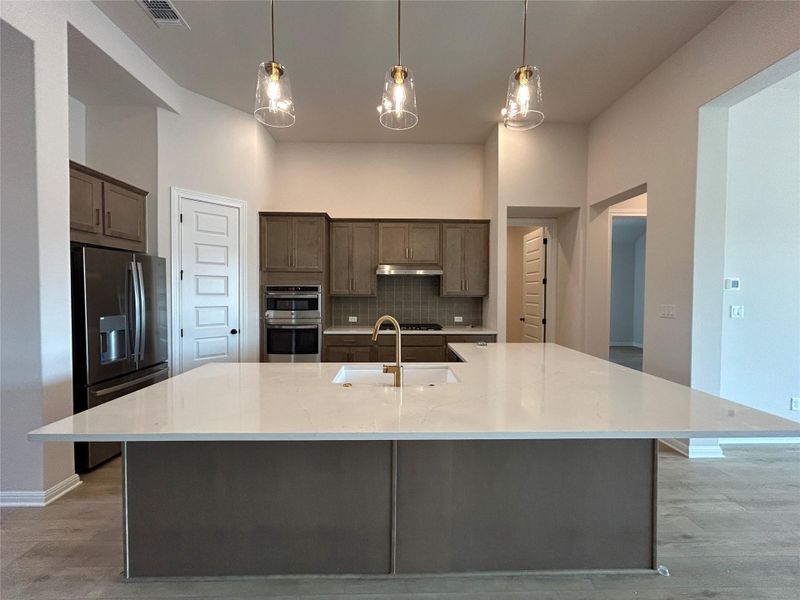 Furnished interior view inside a new home in Provence 70s, Austin (Image 9). Furnished interior view inside a new home in Provence 70s, Austin (Image 9).