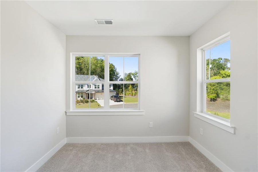 Spacious, unfurnished interior of a new home in Settingdown Farms, Cumming (Image 24).