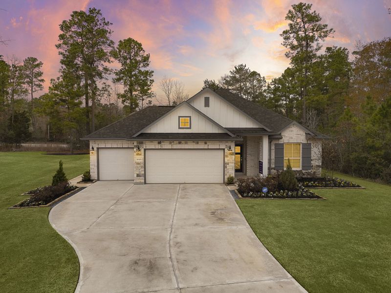 A house with a driveway. A house with a driveway.