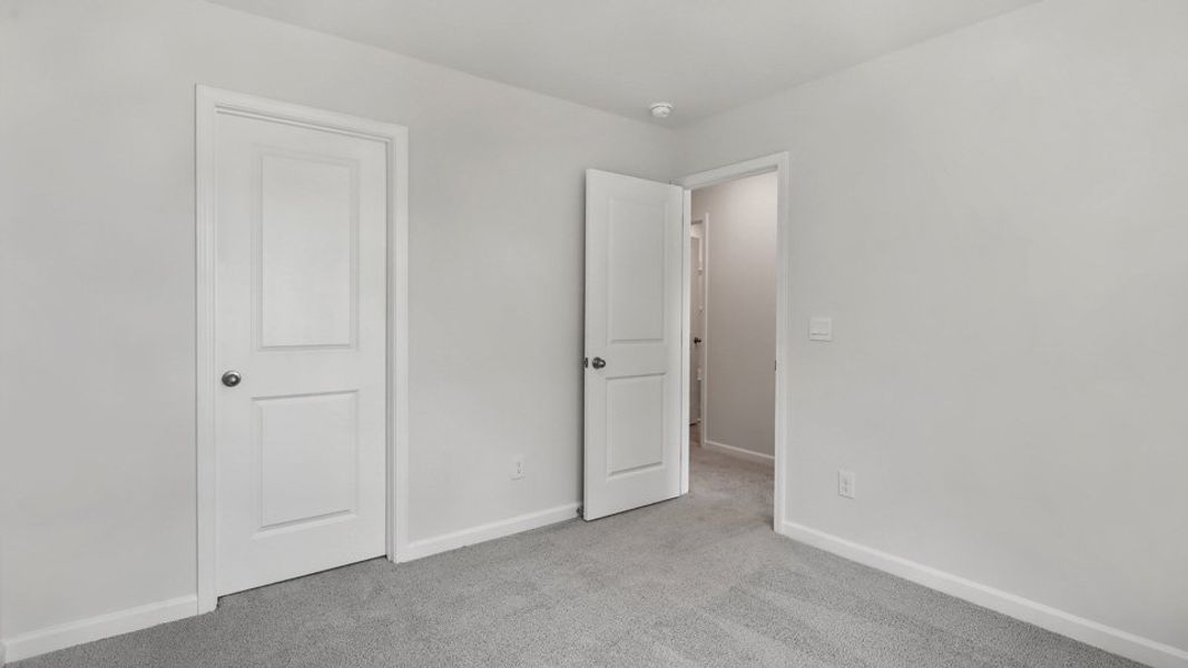 Spacious, unfurnished interior of a new home in The Gables at Edinborough Townes, Gibsonville (Image 18).