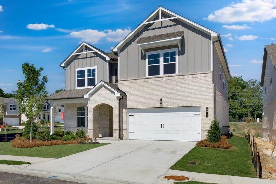 Front exterior of a new home in Oakmead, Buford, GA, highlighting curb appeal (Image 20). Front exterior of a new home in Oakmead, Buford, GA, highlighting curb appeal (Image 20).