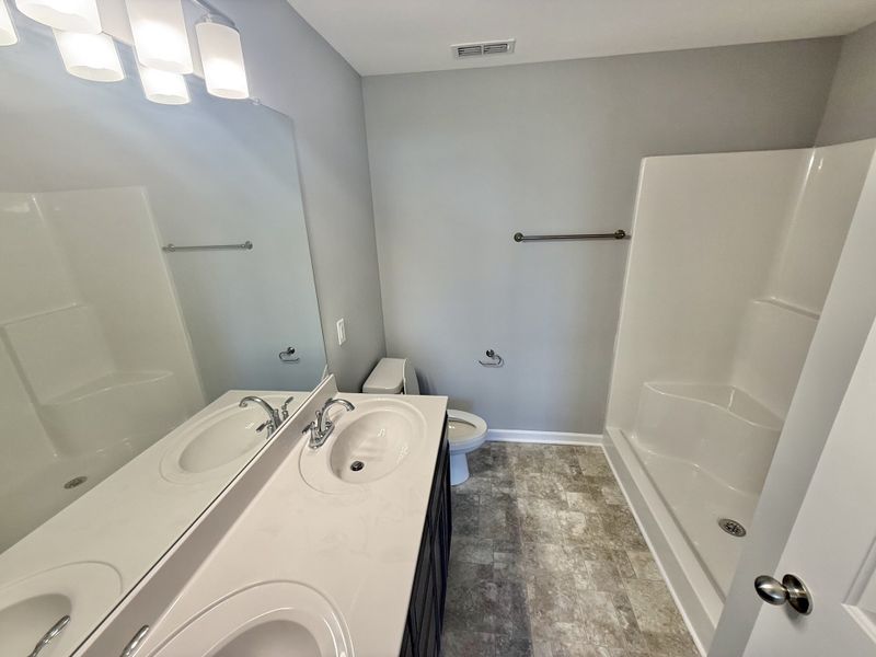 Furnished interior view inside a new home in Stonehenge, Manchester (Image 4).