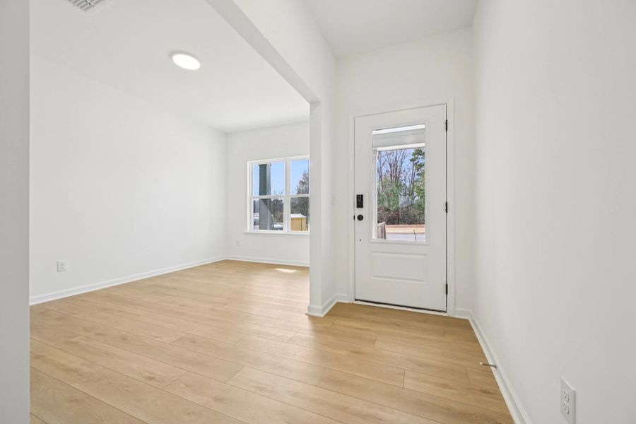 Foyer featuring the AW Collection® Sapphire - Bright white meets bold blue for a daring welcome.