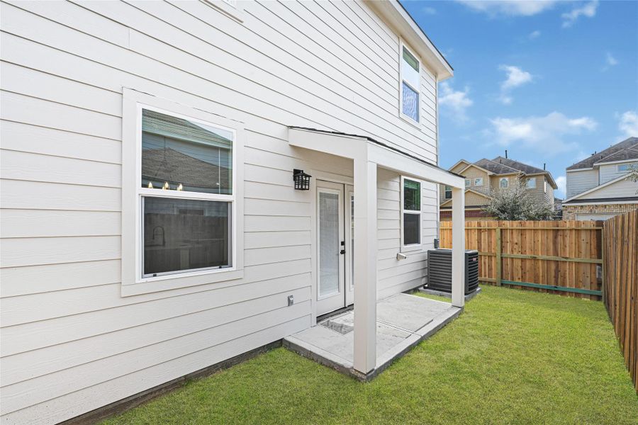Exterior details and patio area of a home in , Houston (Image 26). Exterior details and patio area of a home in , Houston (Image 26).