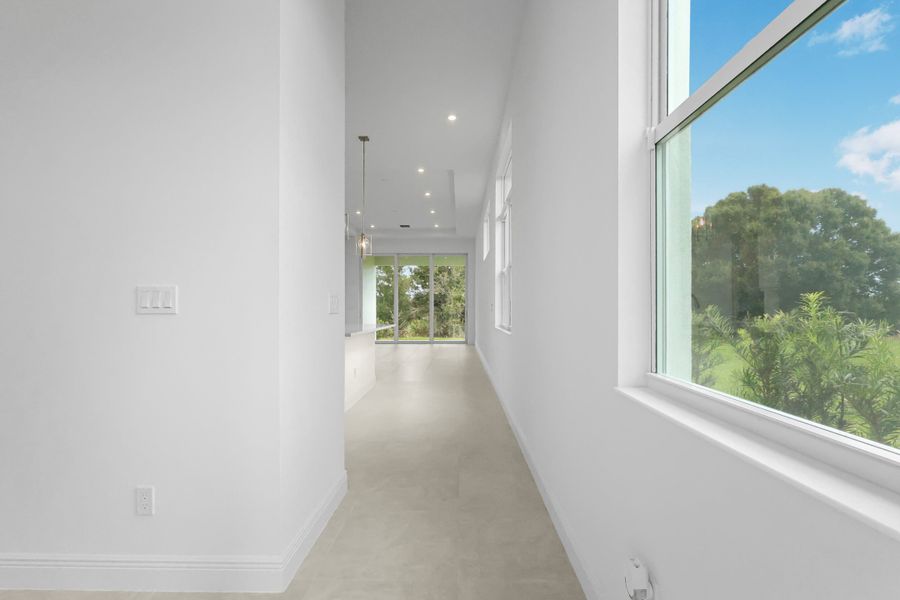 Spacious, unfurnished interior of a new home in Rivella, Port St. Lucie (Image 13).