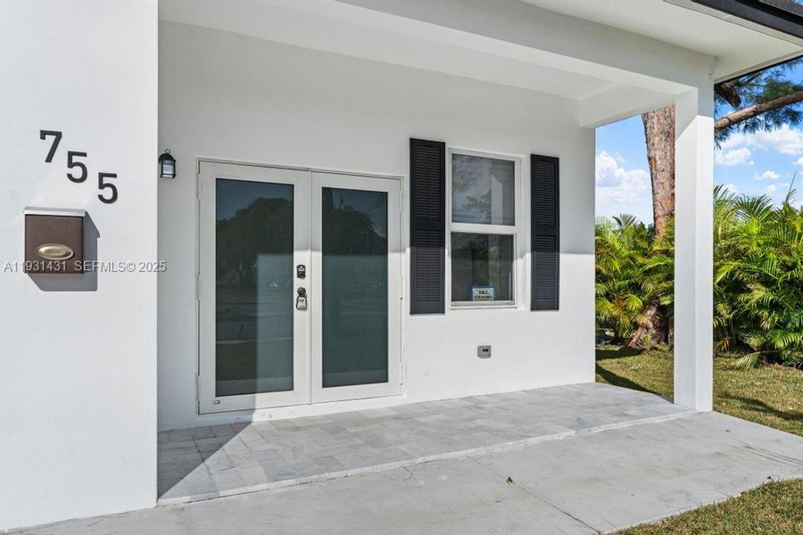 Exterior details and patio area of a home in , Miami (Image 1). Exterior details and patio area of a home in , Miami (Image 1).