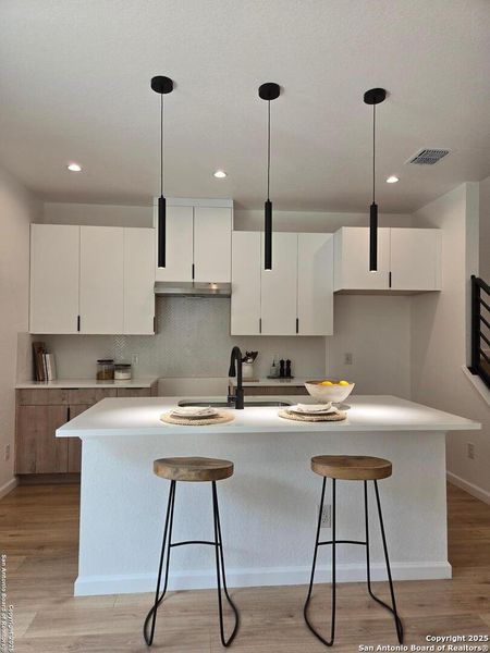 Furnished interior view inside a new home in , San Antonio (Image 33).