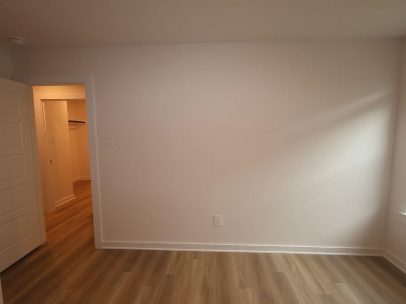 Spacious, unfurnished interior of a new home in Pinewood at Grand Texas, New Caney (Image 21).