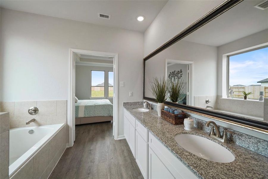 Spacious Owner’s Bath with Dual Vanities for Added Comfort