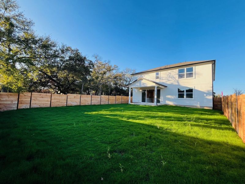 Rear of Home and Private Backyard