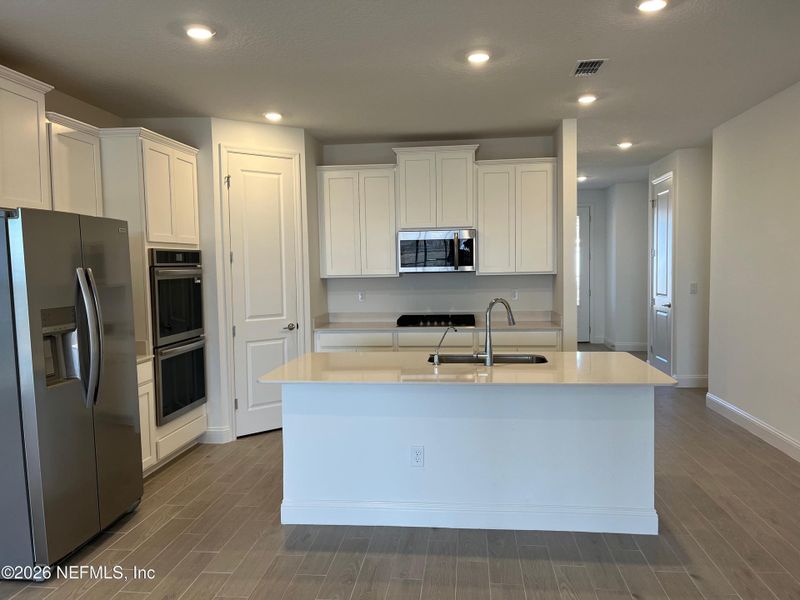 Furnished interior view inside a new home in Silver Falls Single Family at SilverLeaf, St. Augustine (Image 6).