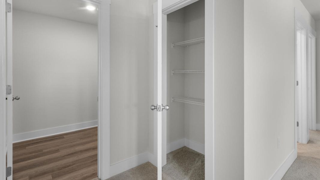 Spacious, unfurnished interior of a new home in Surfside Landing, Hubert (Image 24).