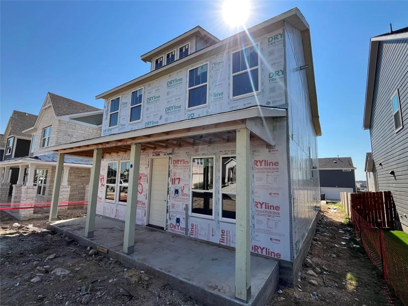 In-progress construction of a new home in The Cottages at Lariat, Liberty Hill, TX (Image 26).