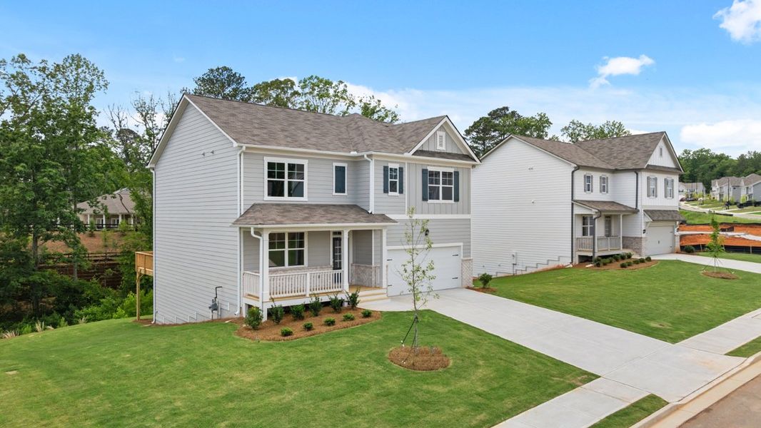 Representative exterior photo of a completed home built from the Hayden by D.R. Horton in Thompson Ridge, Dallas, GA (Image 2). Representative exterior photo of a completed home built from the Hayden by D.R. Horton in Thompson Ridge, Dallas, GA (Image 2).